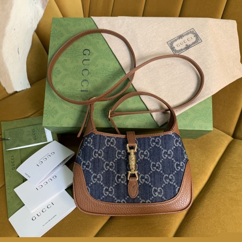 G*u*i top handle bags